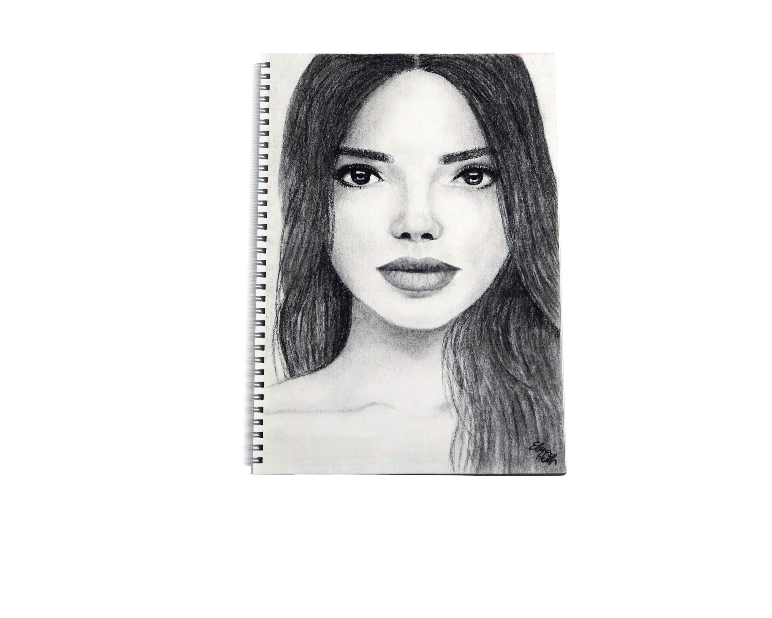 Eine Kohle Zeichnung im HEMPA Design- & Zeichenblock. Zu sehen eine junge Frau mit langen Haar.